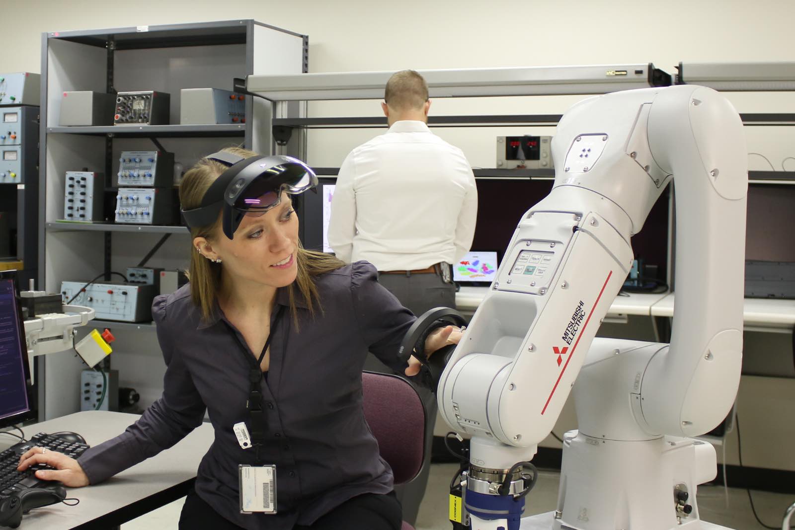 A professional learner uses a robot at the K-State Salina campus